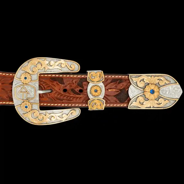 Our Alpine Three Piece Buckle Set highlights your ranch brand or initials in true western style! Crafted on dual hand engraved and matted silver base with golden Jeweler's Bronze scrollwork and custom ranch brand or initials. Order now!